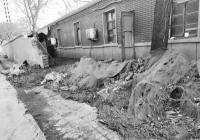 一老旧小区改造工作中围墙“烂尾” 业主称涉及土地侵占